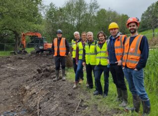 People working at Chellow Dene Wetland
